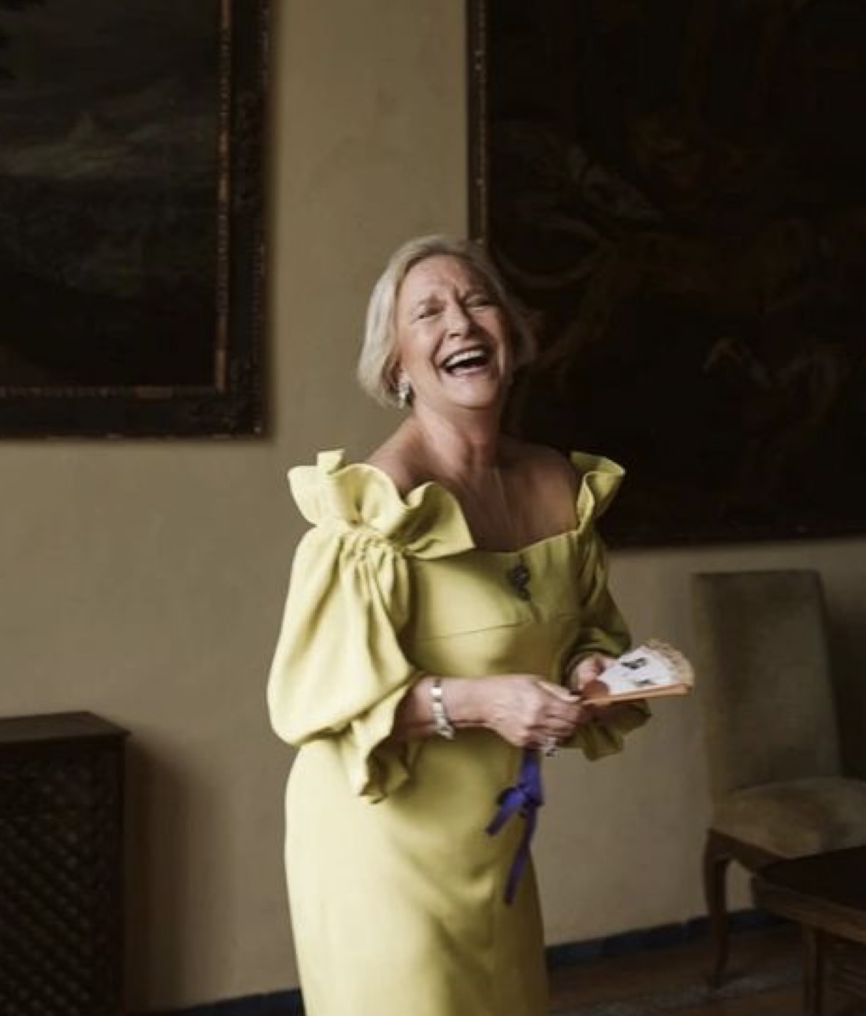 Wedding guest in a yellow dress