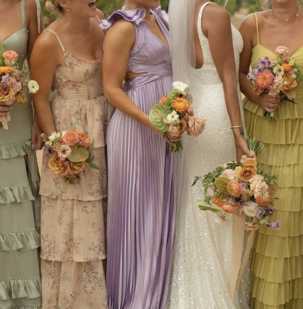 Wedding party in colourful dresses